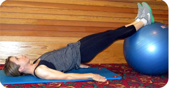 Dawn Shepard demonstrating a bridge on a ball